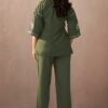 Rear view of an olive green cotton co-ord set for women showing the clean shoulder lines and straight-cut hem.