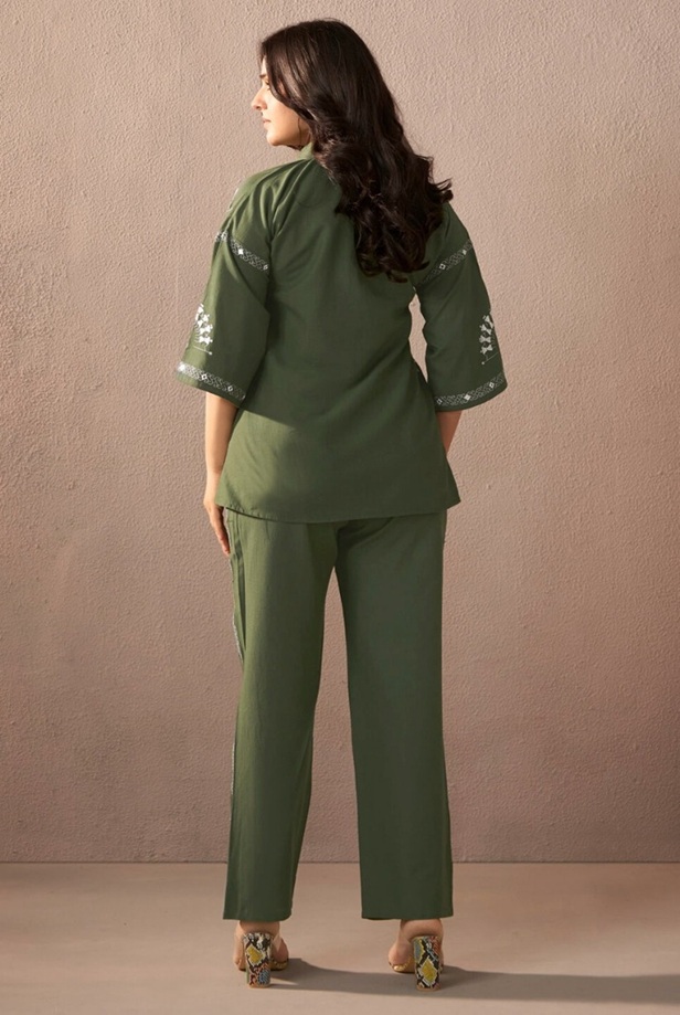 Rear view of an olive green cotton co-ord set for women showing the clean shoulder lines and straight-cut hem.