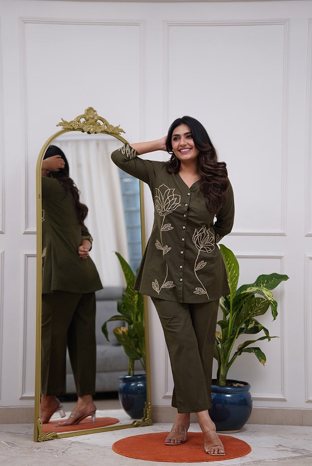 Olive-Leaf-Outline-Embroidered-Button-Down-Co-ord Set-styled Front view of the Olive Leaf Outline Embroidered Button-Down Co-ord Set for Women in forest green.