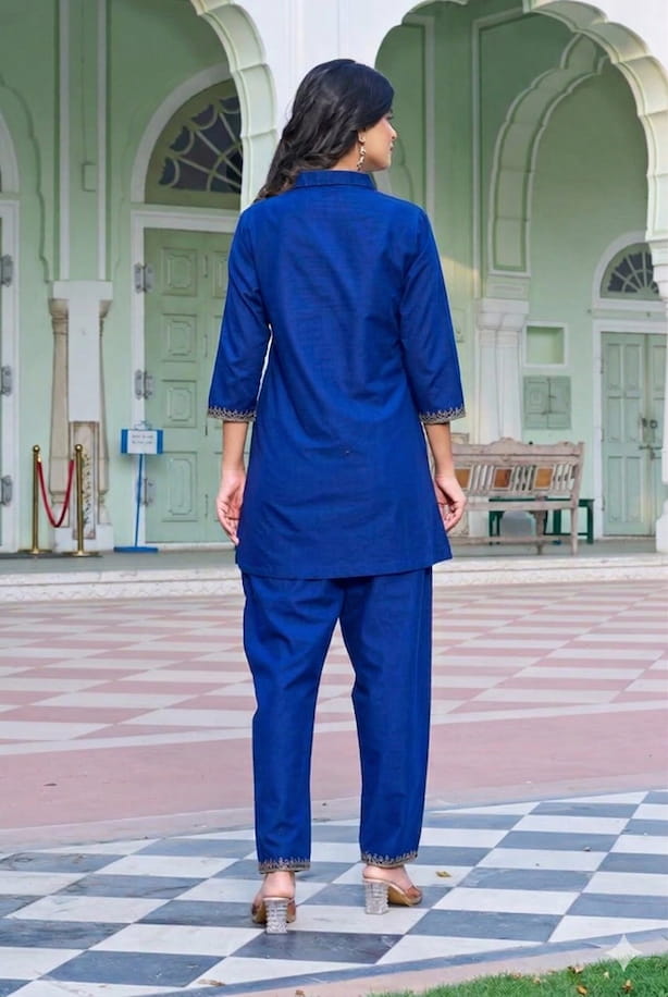 Royal-Blue-Floral-Embroidered-Flex-Cotton-Co-ord-Set-back-view Back view of a royal blue two-piece co-ord set showing the clean tailored silhouette and high-quality flex-cotton drape.