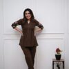 espresso-pin-tuck-mandarin-tunic-coord-styled A lifestyle shot of a woman styling the espresso brown pin-tuck tunic co-ord set as a chic 2-piece Indo-western outfit for a summer event.