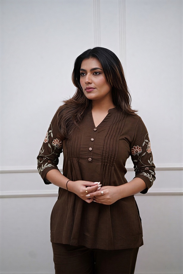 The back view of this espresso brown pin-tuck tunic complete set showcases the feather-light drape and comfortable fit of the matching top and trousers.