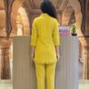 Rear view of the Mustard Yellow Artisan embroidered 2-piece co-ord set, highlighting the back structure, fit, and tailoring of the top and pants.