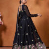 Rear view of a black georgette gown showing a deep neck design and flowing sheer sleeves.