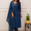 A model styled with traditional jhumkas and pearl-work juttis wearing the Sapphire Blue Designer Kurta Set.