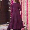 Rear view of a deep wine silk-blend Anarkali showing a clean back design and the voluminous floor-length flare.