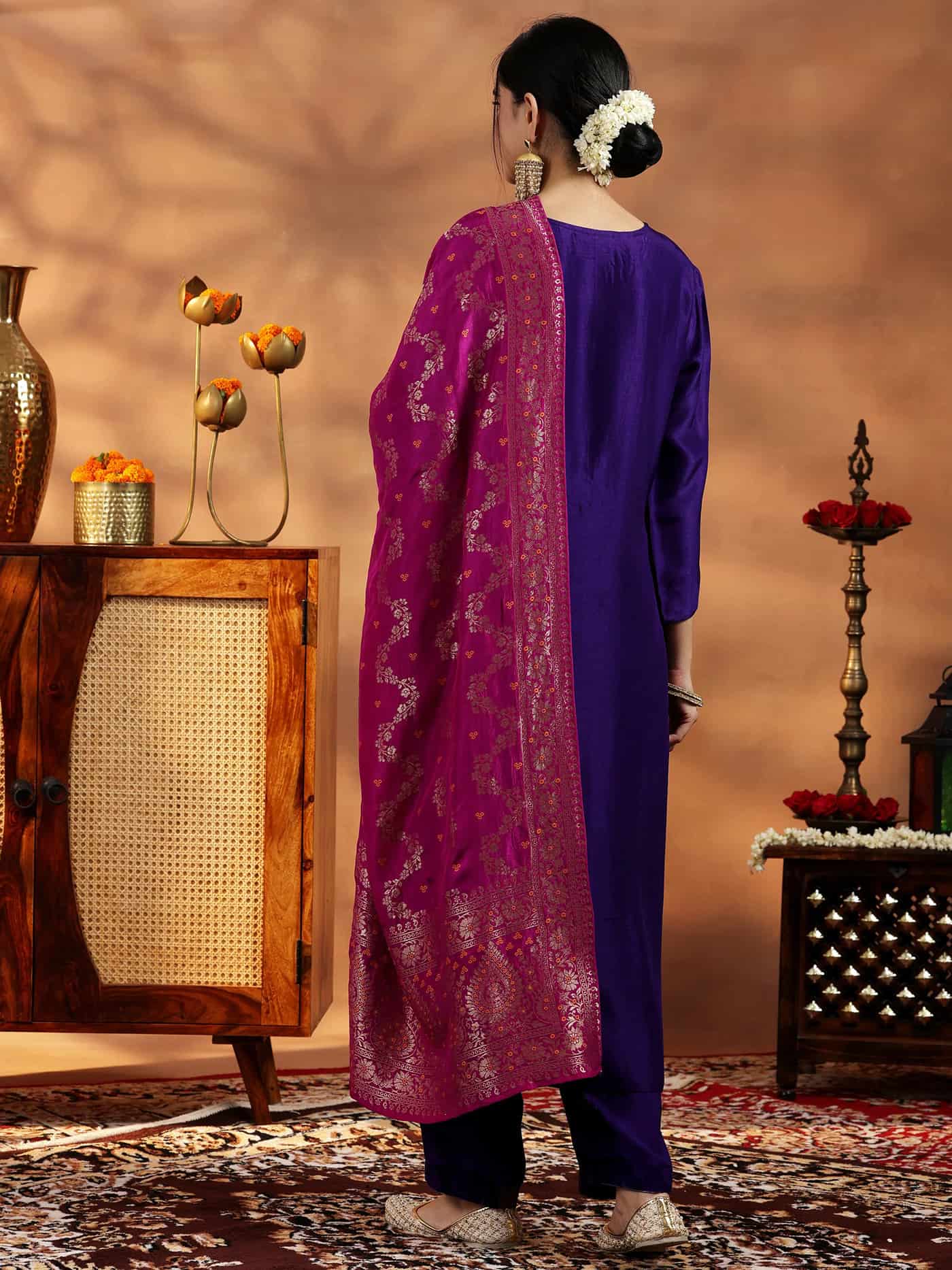 Rear view of a deep purple silk-blend kurta featuring a clean, structured fit and a premium metallic sheen.